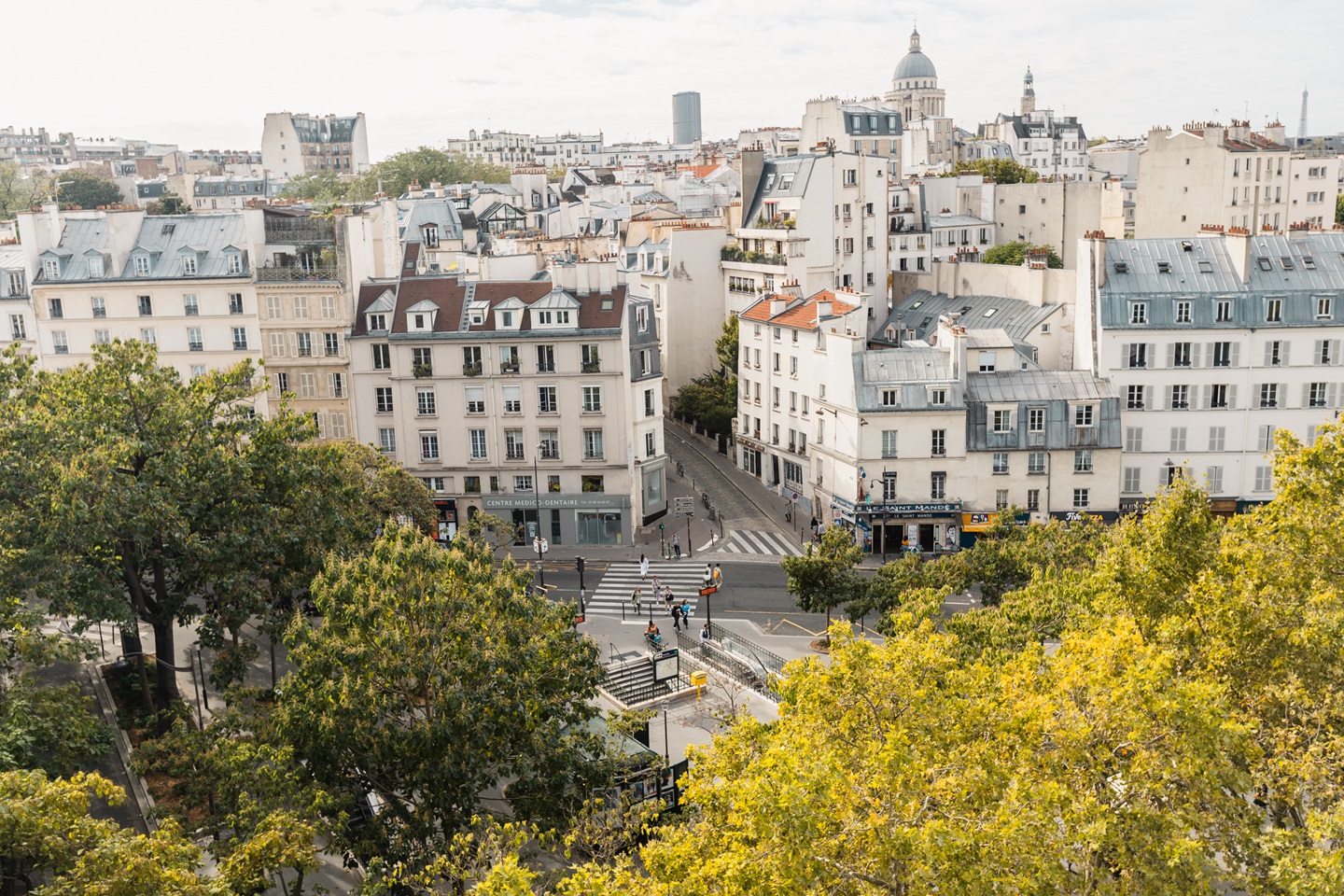 Paris apartment buildings with a park in the front